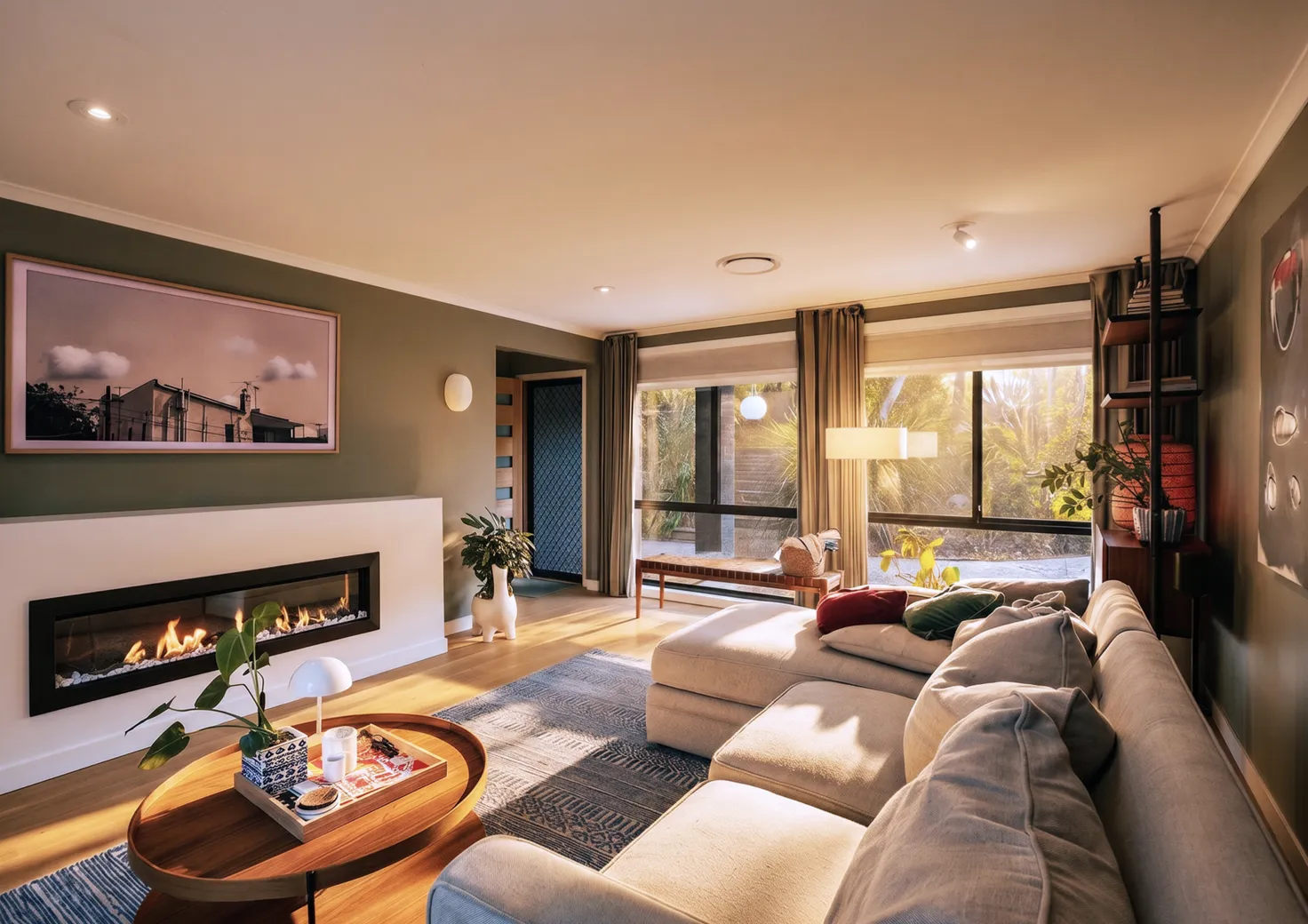 Living room with electric fireplace and sectional sofa